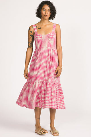 Woman wearing pink and white linen gingham check Calista Dress by Allison Wonderland. 