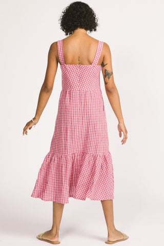 Back view of woman wearing pink and white linen gingham check Calista Dress by Allison Wonderland. 