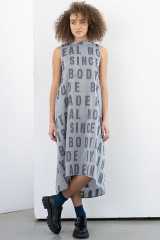 Model wearing custom printed Benetar dress by Bodybag. 