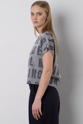 Model wearing bespoke printed Celebration top by Bodybag. 