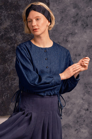 Model wearing organic cotton blend denim button up Rosetta top by Jennifer Glasgow. 