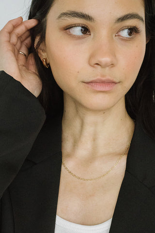 Model wearing gold plated brass Beverly Necklace by Kara Yoo. 