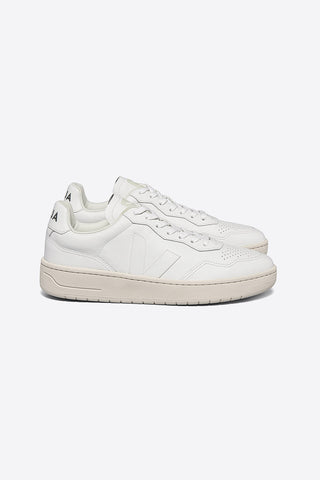 Side view of Veja V-90 Organic Traded Leather White eco-friendly sneakers. 