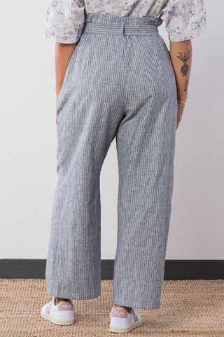 Back view of model wearing railway stripe organic cotton / hemp blend wide leg Lozen pant by Jennifer Glasgow. 