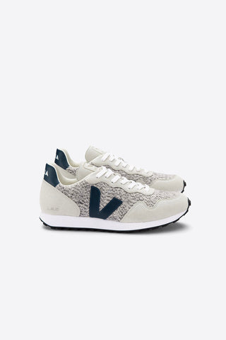 Grey and navy vintage inspired flannel and suede panelled SDU sneakers by Veja. 