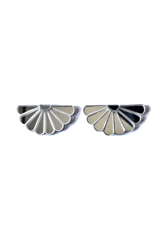Pair of silver plexiglass fan-shaped earrings on a white background