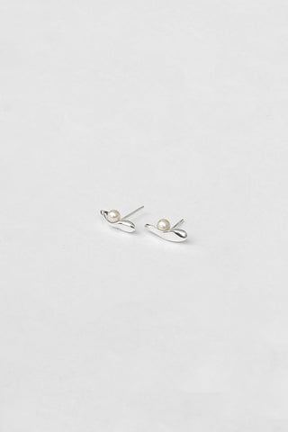 Sterling silver and pearl Hidden stud earrings by Karen Yoo. 