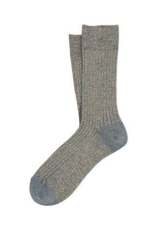 A pair of grey lurex ribbed knit socks on white background. 