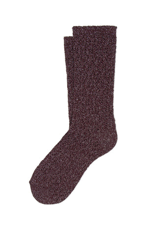 A pair of bordeaux lurex crew length socks against a white background. 