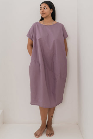 Model wearing lilac oversized Organic Shape Dress by Ablesia. 