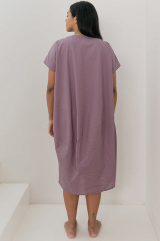 Back view of model wearing lilac oversized Organic Shape Dress by Ablesia. 