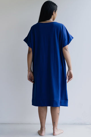 Back view of model wearing oversized blue cotton Straight Dress by Ablesia. 