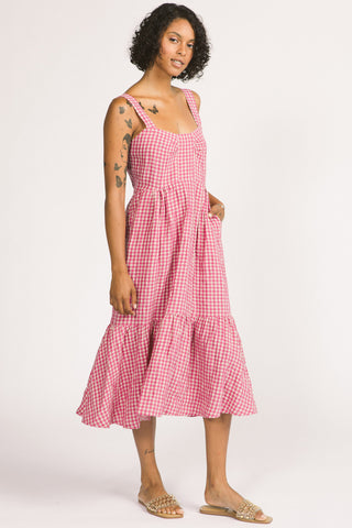 Woman wearing pink and white linen gingham check Calista Dress by Allison Wonderland. 