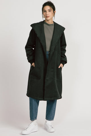 Model wearing dark grey zip up Lenora Coat by Allison Wonderland. 