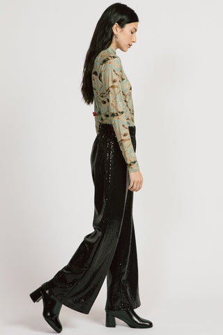 Model wearing black sequins Trixie pants by Allison Wonderland..