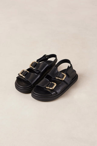 Black leather Harper sandals by Alohas. 