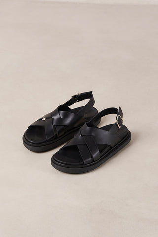 Black leather Trunca sandals by Alohas. 