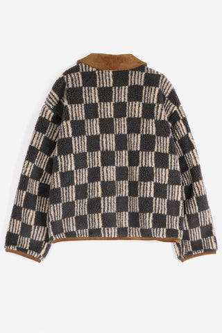 A sherpa jacket with brown and beige checkerboard pattern, featuring a brown corduroy collar and trim, displayed against a light gray background.