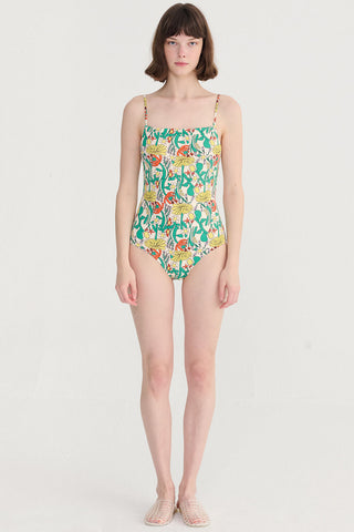 Woman wearing multi-colour floral print swimsuit. 
