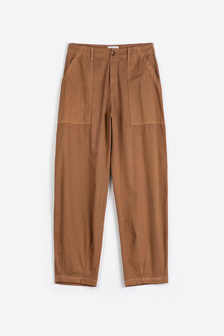 Brown pants with large front pockets and tapered hem. 