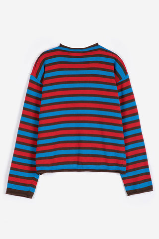 A long-sleeve knit top with horizontal stripes in red, blue, and black featuring raw edge rolled up edges, flat on white background. 