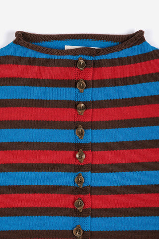 A close-up of a striped knit top with horizontal bands of red, blue, and dark brown, featuring a button-up front with brown buttons.