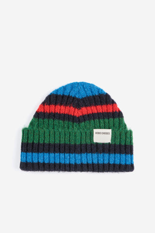 Flat lay image of multi-colour knit beanie by Bobo Choses. 