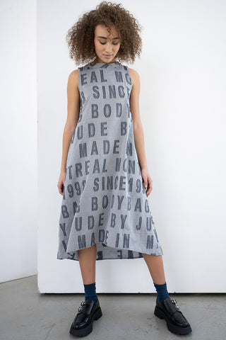 Model wearing custom printed Benetar dress by Bodybag. 