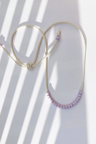 Cream and lilac rope and paper bead Simone necklace by Cartouche. 