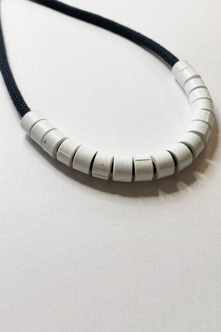 Black and white rope and paper bead Simone necklace by Cartouche. 