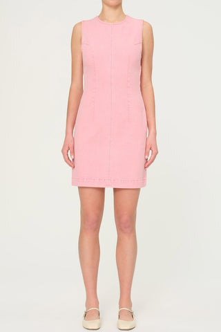 Woman wearing fitted pink denim Esme dress by DL1961. 