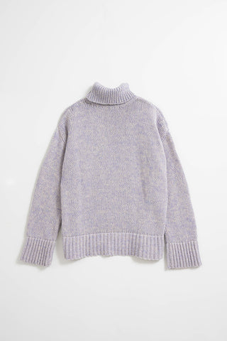 Flat lay of lilac oversized Merino Turtleneck sweater by Dinadi. 