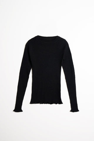 Flat lay of black ribbed merino knit sweater by Dinadi. 