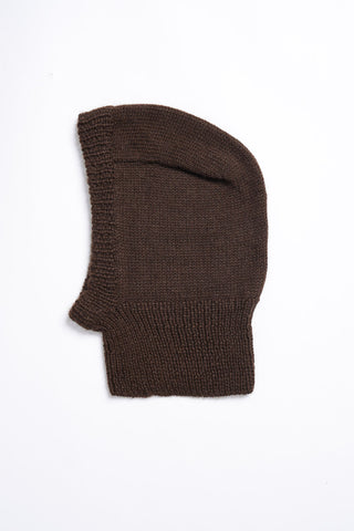 Flat lay photo on white background of brown knit alpaca wool Balaclava by Dinadi. 
