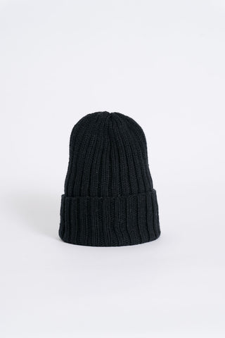 Product photo of black thick knit rib hat by Dinadi. 