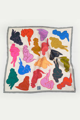 Cream silk scarf with multiple coloured images of woman. 