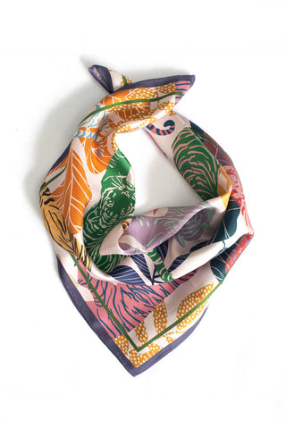 Silk scarf with multi-colour print of tigers and fauna. 