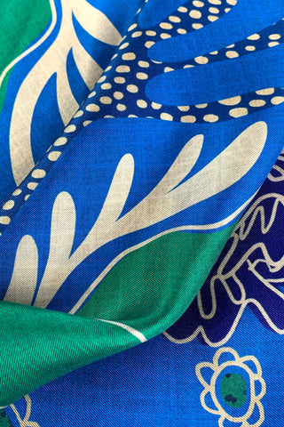 Close-up of blue, green and ivory scarf. 