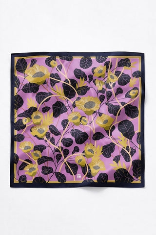 Black and yellow floral print on pink silk scarf. 