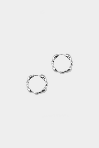 Product photo of medium sterling silver Lara hoop earrings by Kara Yoo. 