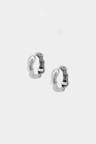 Product photo of medium sterling silver Lara hoop earrings by Kara Yoo. 