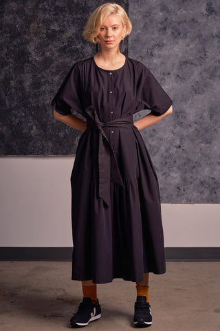 Model wearing black coloured OEKO-TEK belted Adira Shift Dress by Jennifer Glasgow. 