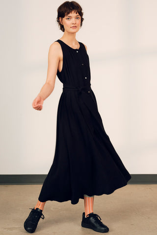Model wearing black belted Alethea maxi dress by Jennifer Glasgow. 