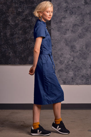 Model wearing flight blue organic cotton Dahomey Dress by Jennifer Glasgow. 