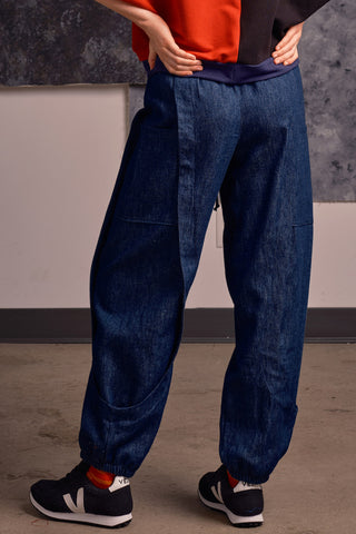 Back view of model wearing denim Finely Pants by Jennifer Glasgow. 