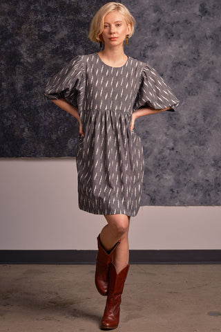 Model wearing grey ikat Loktak dress by Jennifer Glasgow.
