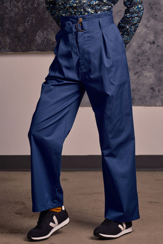Model wearing blue organic cotton Lozen pants by Jennifer Glasgow.