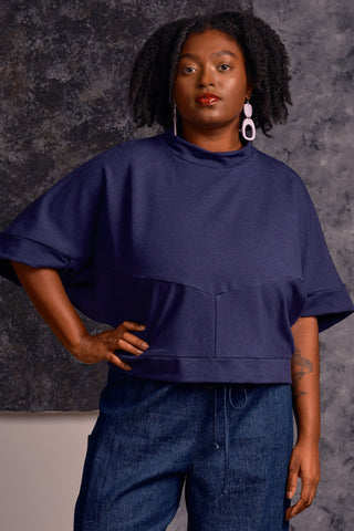 Model wearing navy blue Razia Sweater by Jennifer Glasgow. 