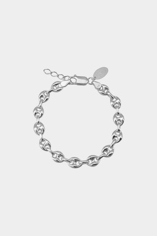 A sterling silver puffy mariner chain bracelet with lobster clasp closure, shown flat on white background. 