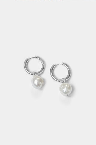 Sterling silver Uma Hoops + Wrinkle Pearl Charm by Kara Yoo. 